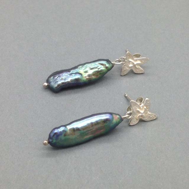Bird with purple pearl earrings (47). Jewellery by Holly Belsher. Silver & pearl. Bird with purple pearl earrings (47). Jewellery by Holly Belsher. Silver & pearl.