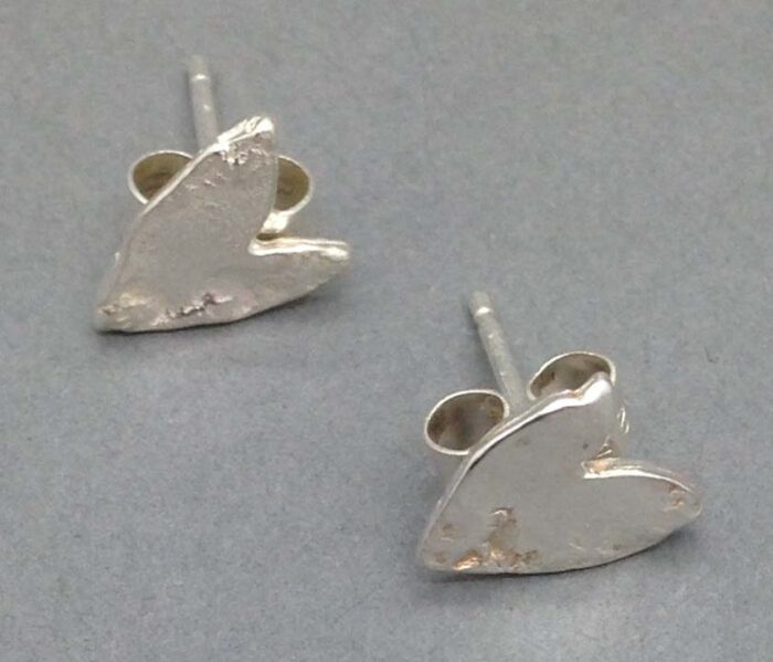 Tiny heart stud (104). Jewellery by Holly Belsher. Silver. Tiny heart stud (104). Jewellery by Holly Belsher. Silver.