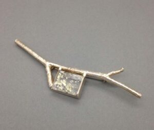 Twig brooch with quartz (7).   Jewellery by Holly Belsher. Silver & quartz.