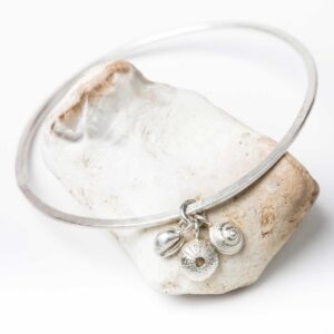 Salcombe Seashells bangle.   Jewellery by Uncategorised. Silver.