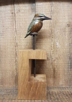 Nailed.   Sculpture by Mark Hall. Bronze.