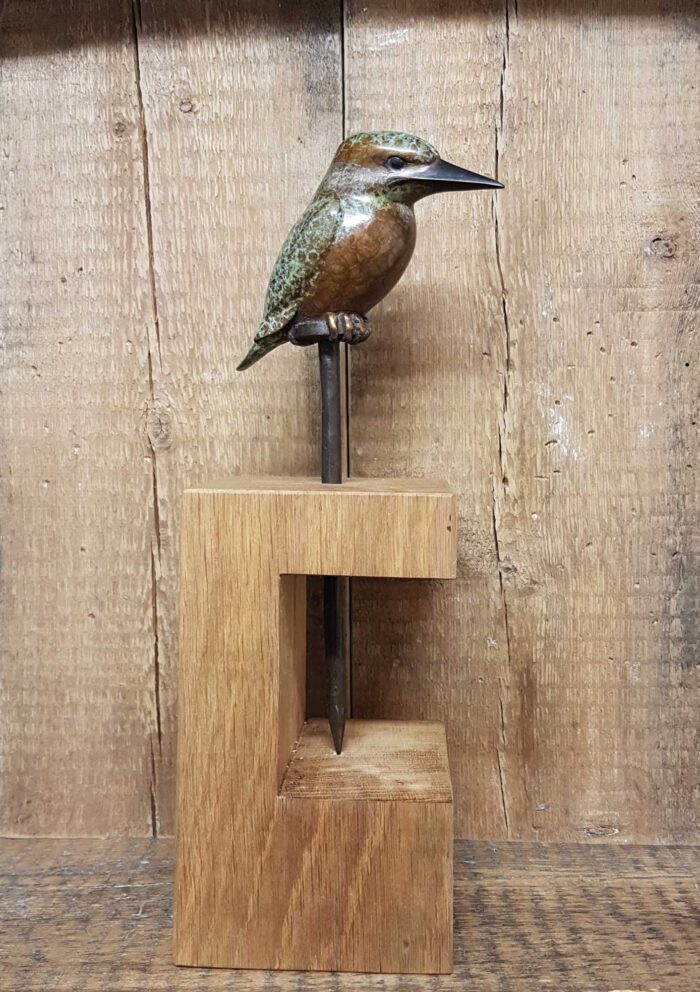 Nailed.   Sculpture by Mark Hall. Bronze.