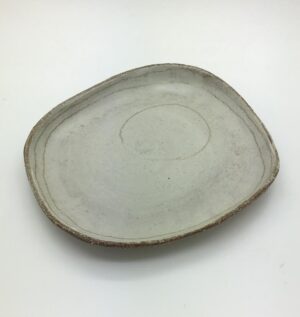 Plate with green rings.   Ceramics by Sue Mundy. Stoneware.