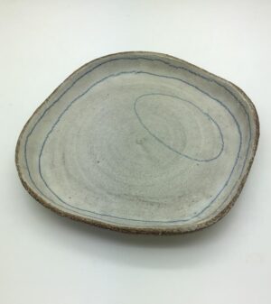 Plate with blue rings.   Ceramics by Sue Mundy. Stoneware.