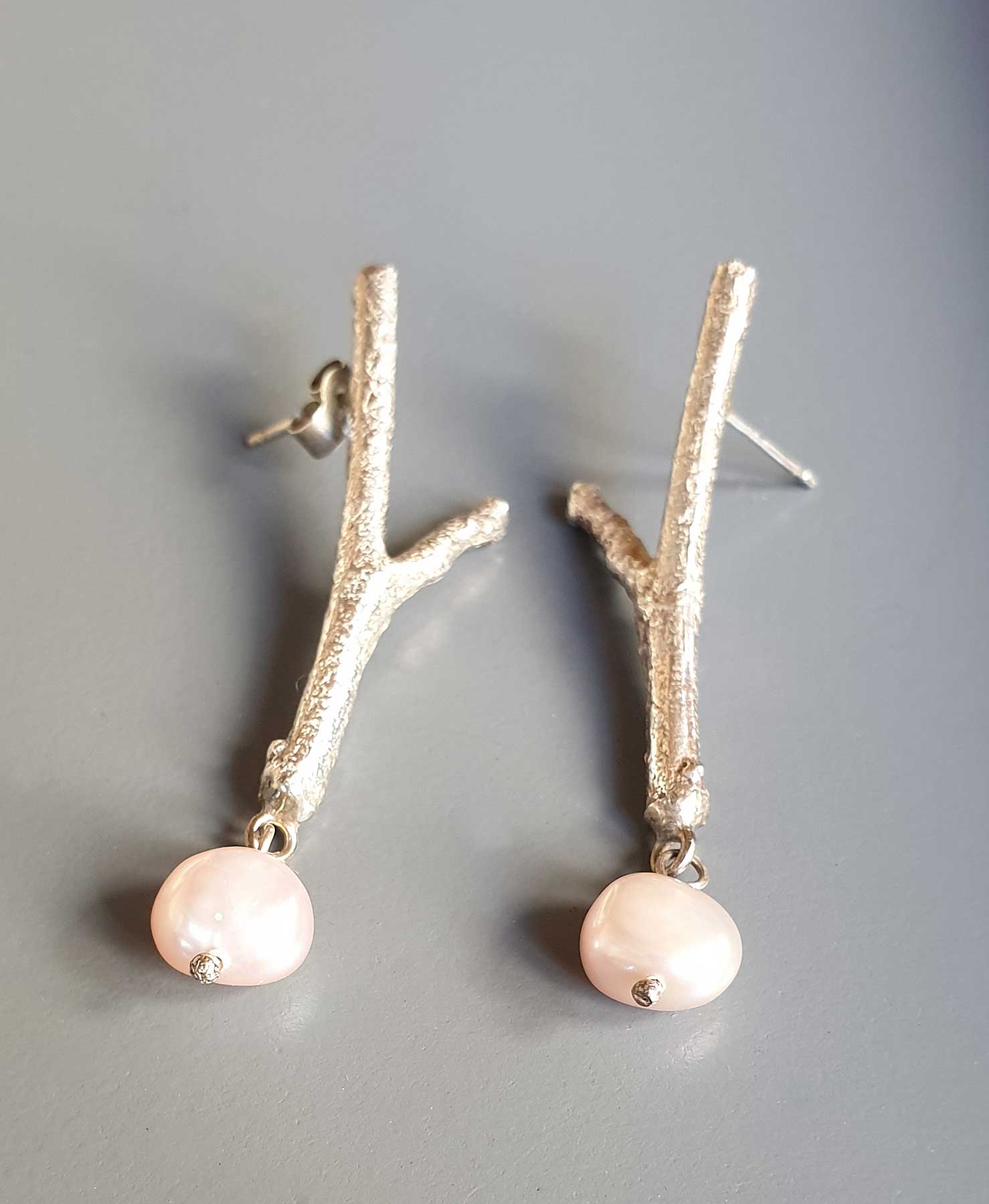 Long Silver Twig Studs Pink Pearl (110). Jewellery by Holly Belsher. Silver. Long Silver Twig Studs Pink Pearl (110). Jewellery by Holly Belsher. Silver.