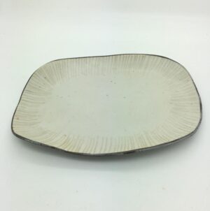 Plate (6).   Ceramics by Sue Mundy. Stoneware.