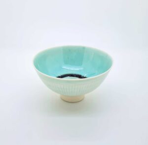 Tiny incised porcelain bowl (160).   Ceramics by Peter Wills. Porcelain.