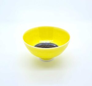 Tiny yellow porcelain bowl (162).   Ceramics by Peter Wills. Porcelain.