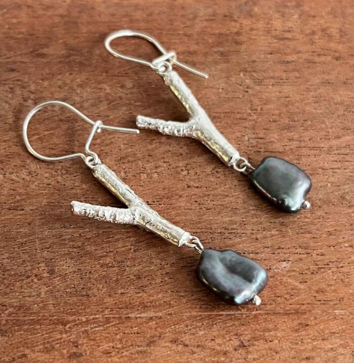Silver twig with purple pearl earrings (34). Jewellery by Holly Belsher. Silver & pearl. Silver twig with purple pearl earrings (34). Jewellery by Holly Belsher. Silver & pearl.