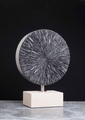 Cirque Blanc. Abstract  Sculpture by Sue Jones. Slate, steel & Portland stone.