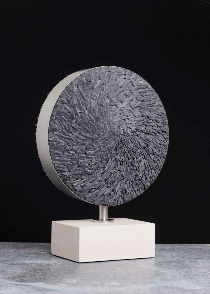Cirque Blanc. Abstract  Sculpture by Sue Jones. Slate, steel & Portland stone.