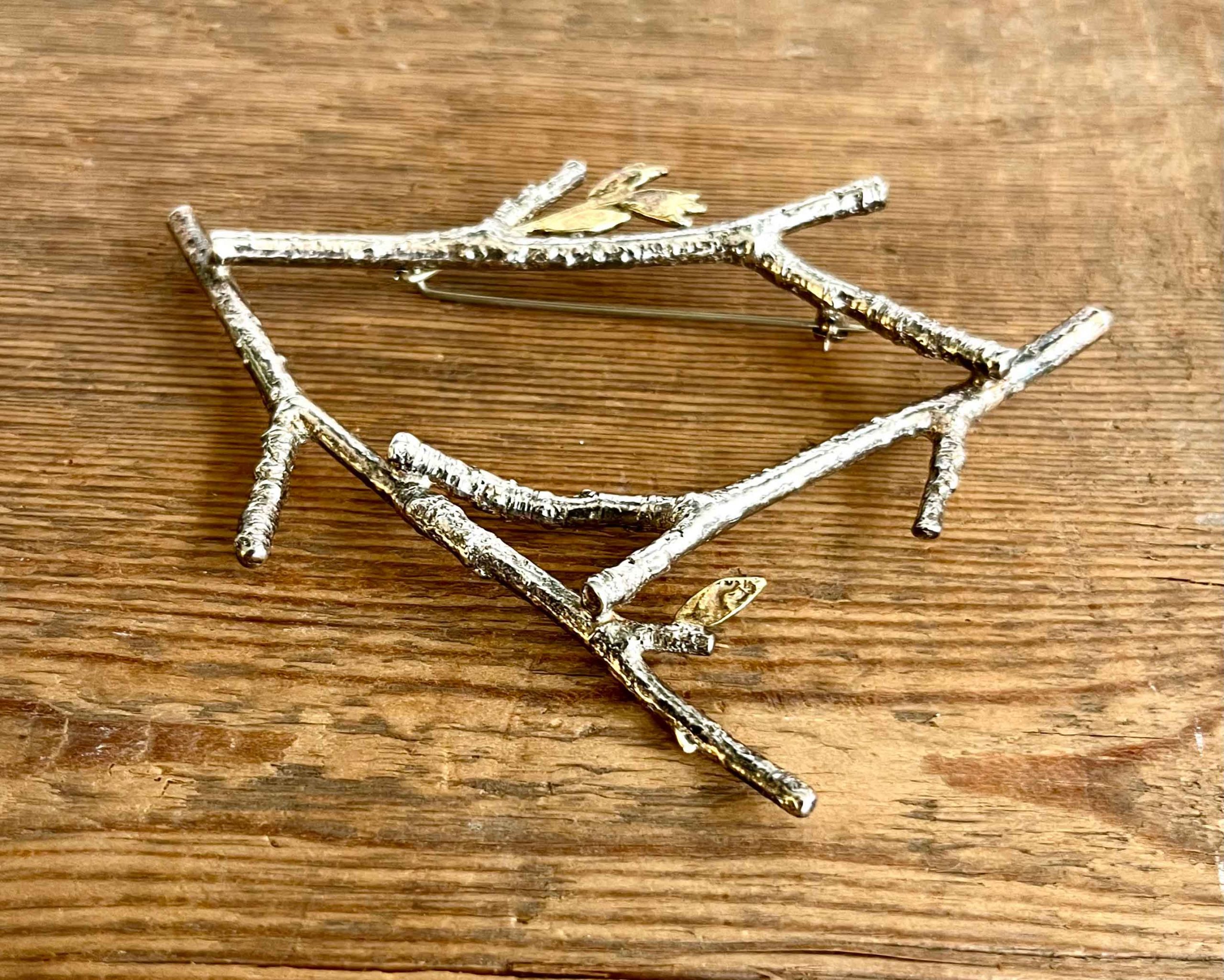 Silver 3 twig brooch with 18ct gold leaves (31).   Jewellery by Holly Belsher. Silver & gold.